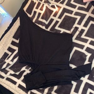 I’m selling this one strap cropped shirt.